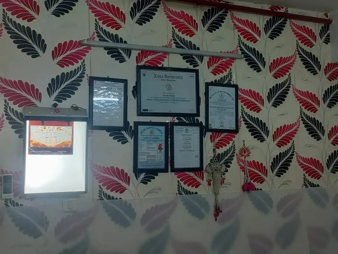 Professional certificates displayed inside the Ghaziabad clinic